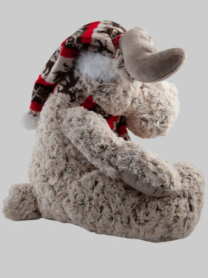 Dekorativ vinterälg i mjuk textil, skandinavisk inredningsdetalj för jul och vintermys.